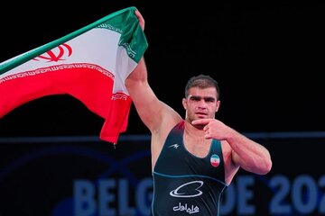 عکس| واکنش متفاوت اتحادیه جهانی به طلای میرزازاده