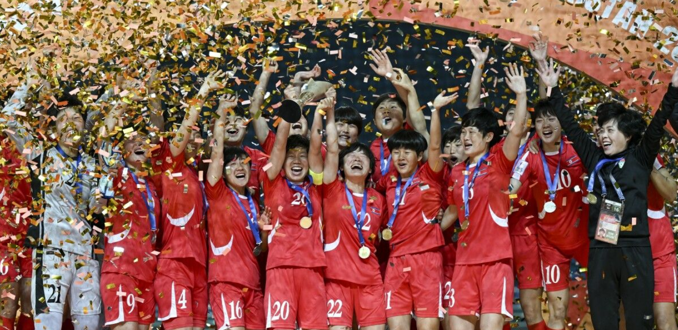 DPR Korea fight back to lift title