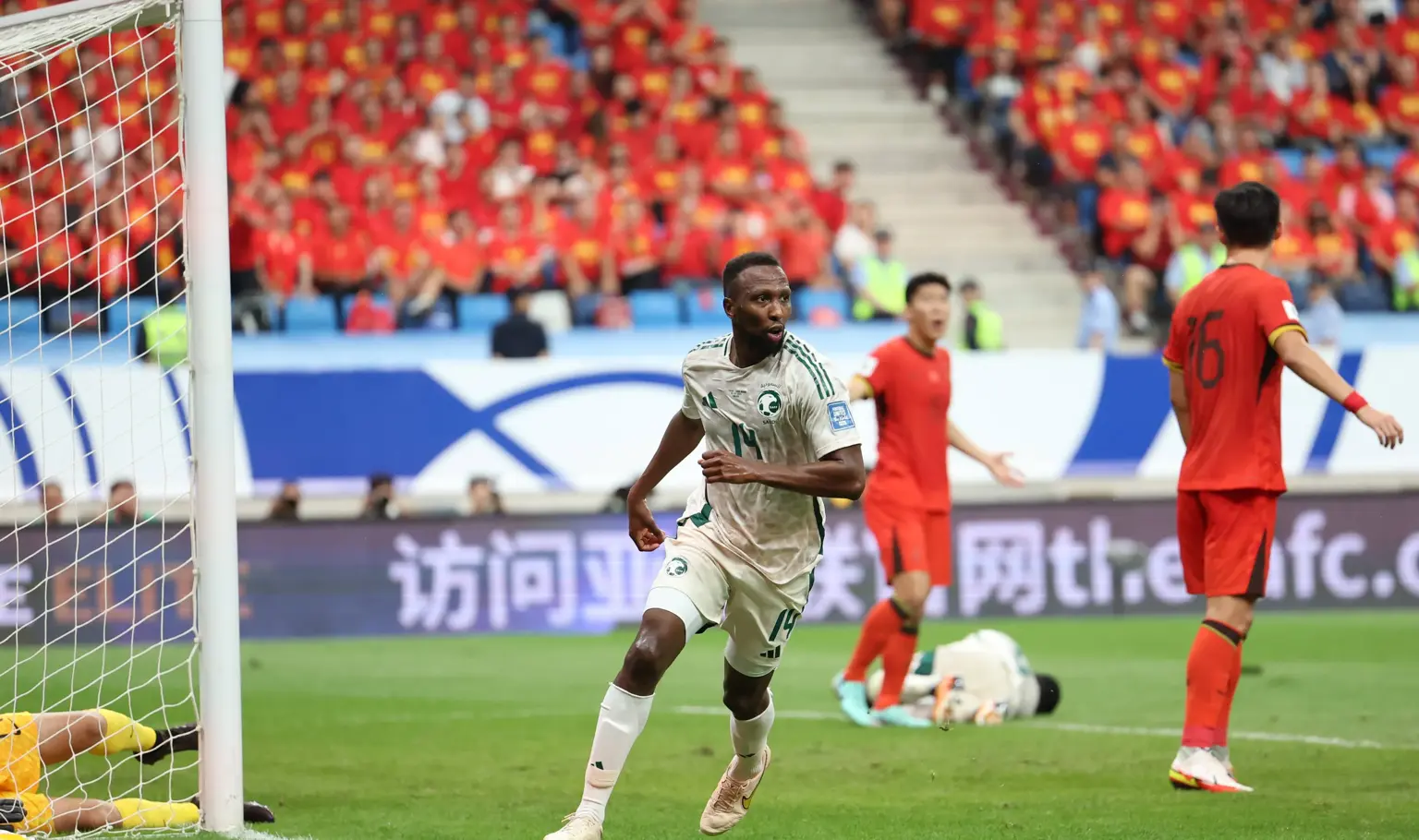 Ten-man Saudi stun China; Indonesia and Korea DPR dig in for draws